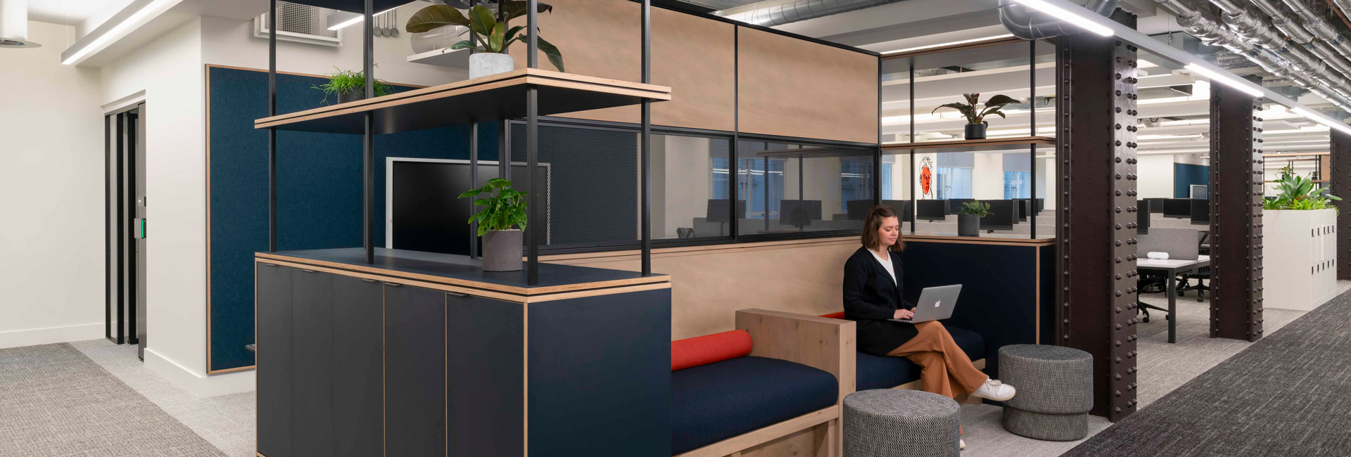 Spacious office with desks and a couch at Page Group