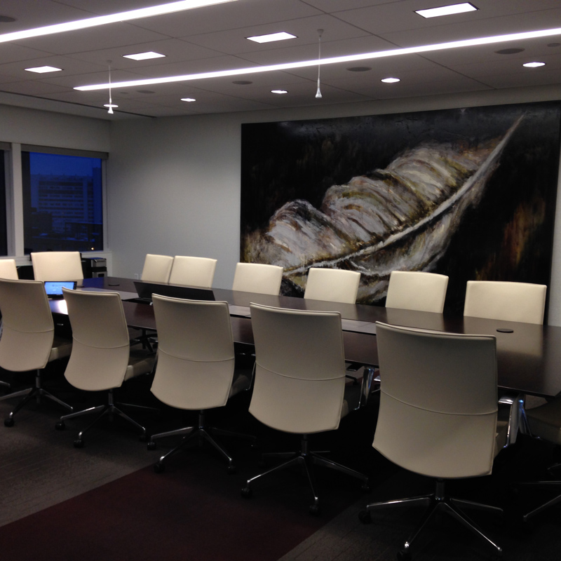 Conference room with a long table and several chairs