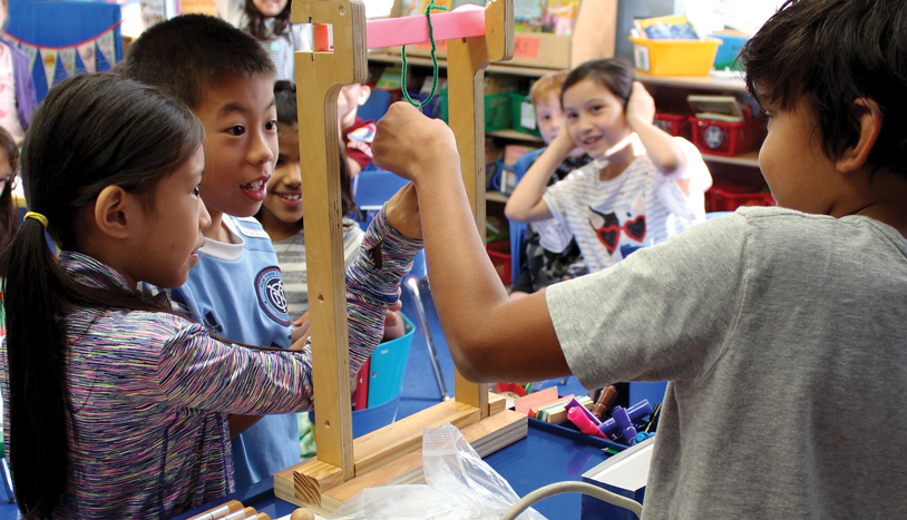 Children at the NYC Salvadori Center creating a bridge