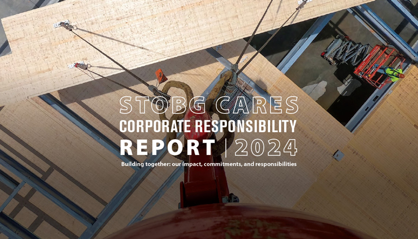An image of a crane holding a piece of wood for a large mass timber project with the title STOBG Cares Corporate Responsibility Report 2024 overlay