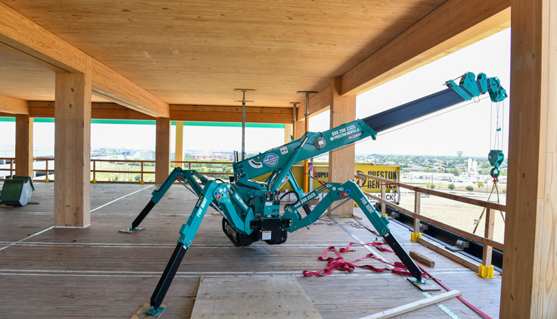 A mass timber project with a crane robot.