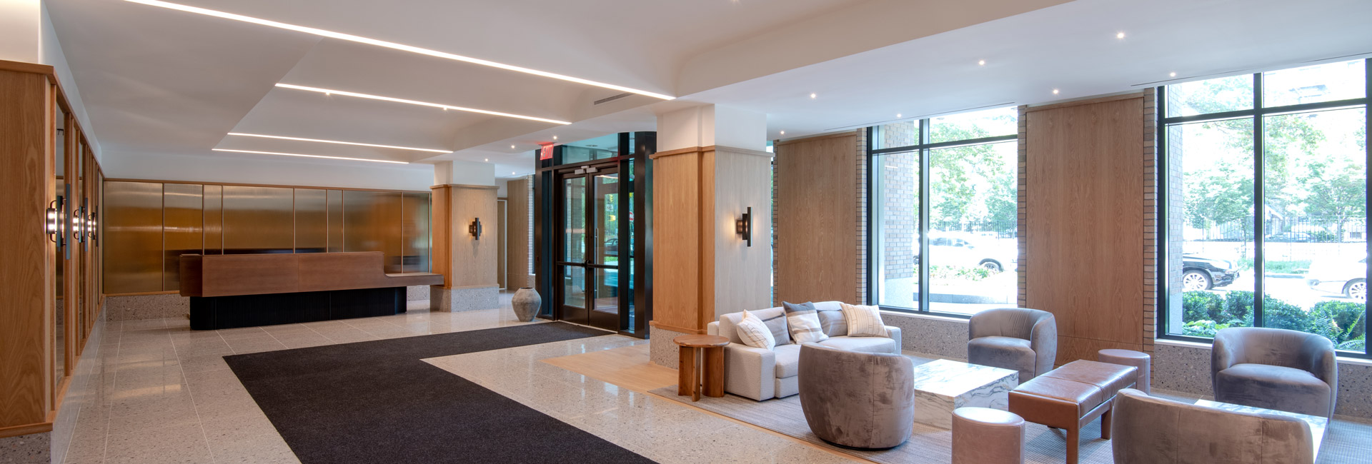 Lobby area with chairs and couches for seating