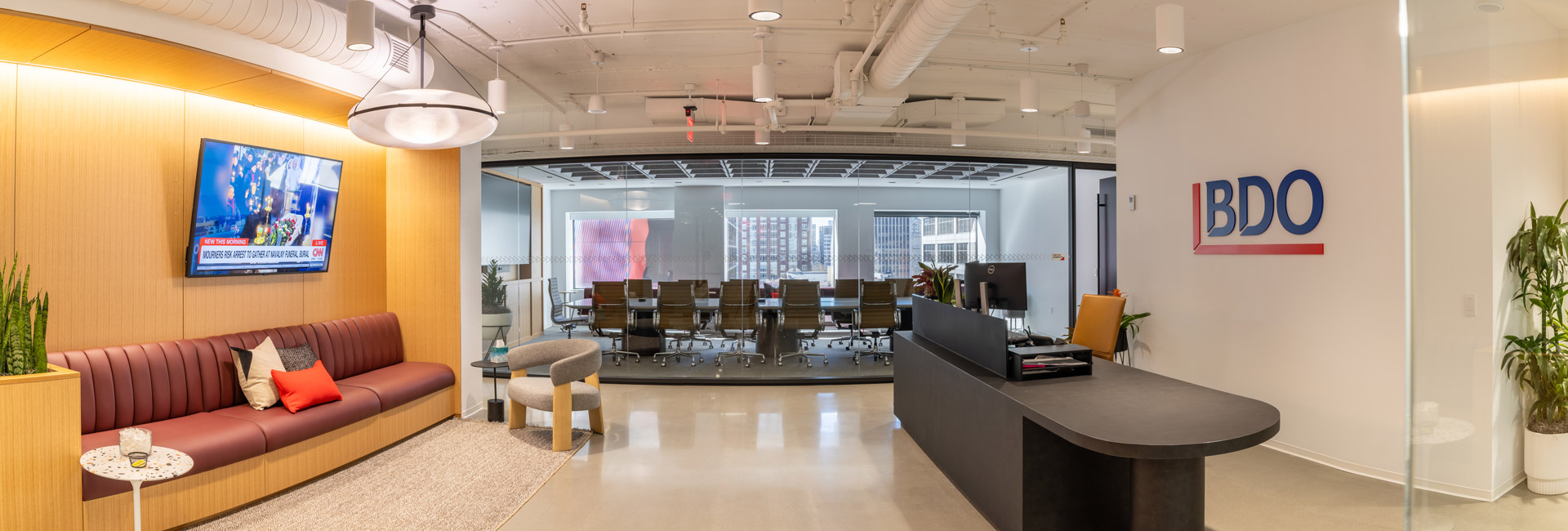 Modern office lobby of BDO USA featuring sleek furniture and contemporary design elements.