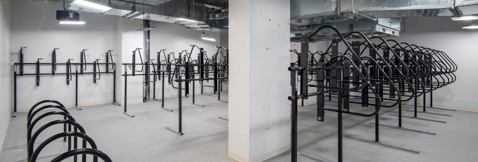 A room filled with numerous bike racks.
