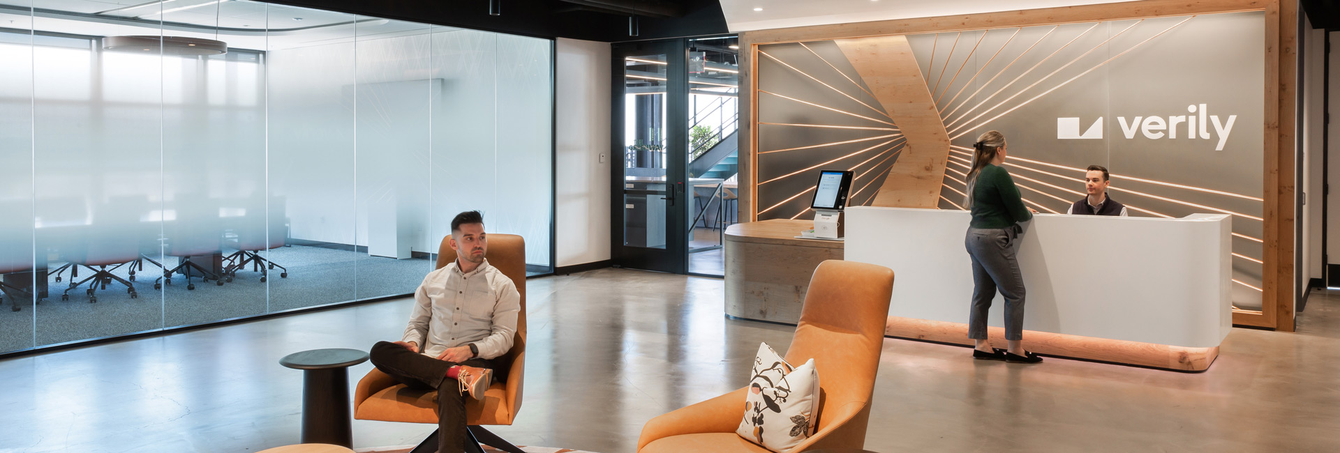 A welcoming and modern entrance with a front desk to greet people.