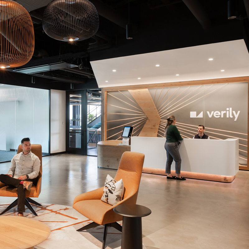 A welcoming and modern entrance with a front desk to greet people.
