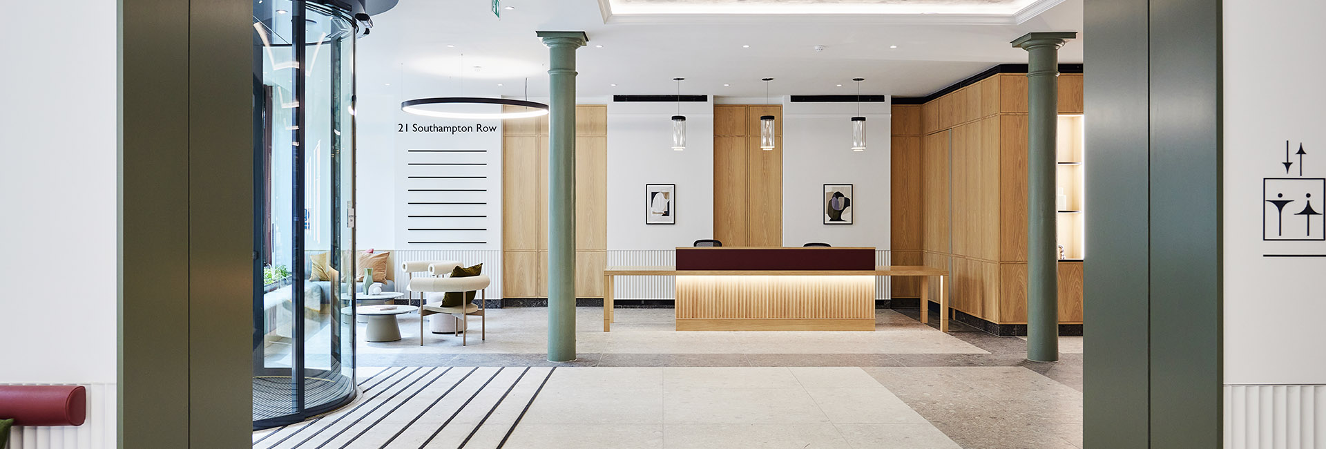 Bloomsbury lobby in wood and green accents build by Structure Tone London