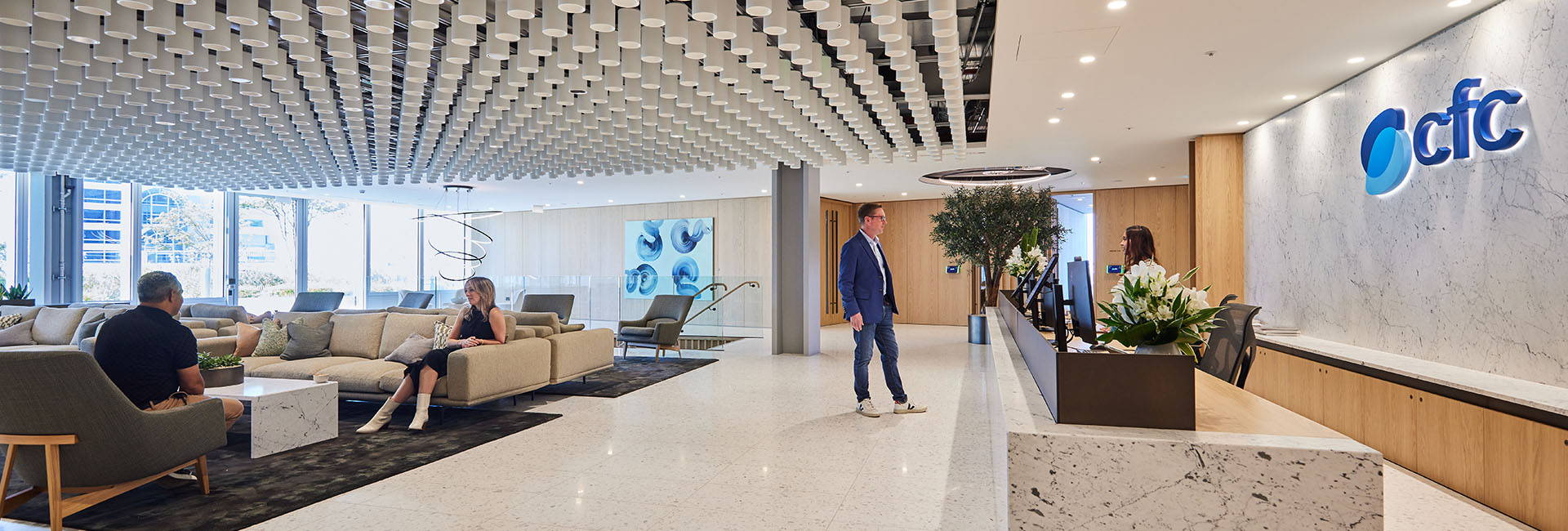 CFC Underwriting lobby with Blue logo sign behind the reception desk
