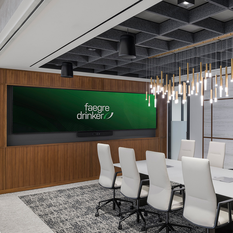 Faegre Drinker conference room with green screen and logo renovations done by Structure Tone Southwest
