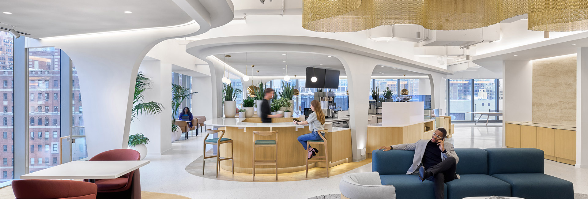 Confidential Financial Client image of lounge area with wall of windows and bar area