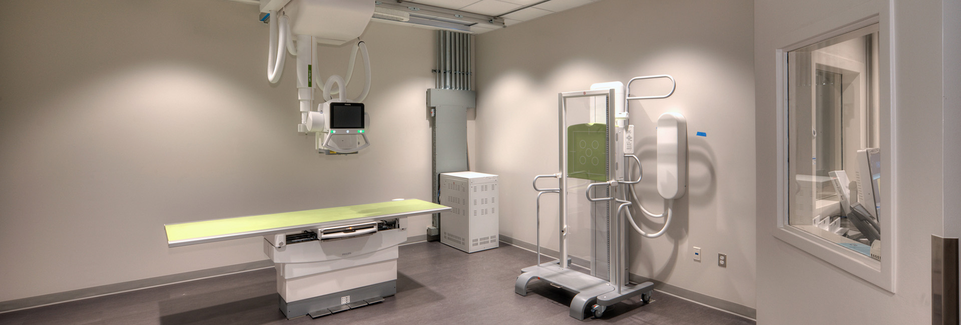 University Health Wheatley imaging room with lime green table for patient to lay on