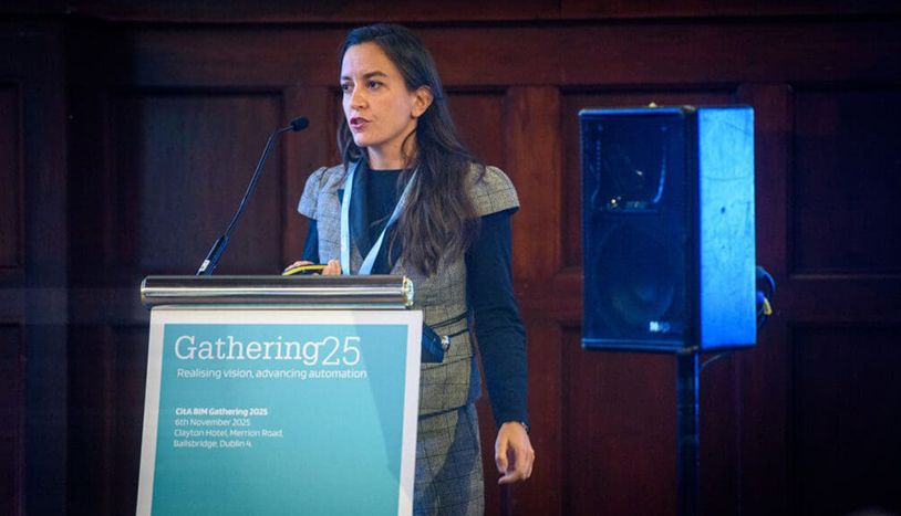 UK CitA speaker at a podium