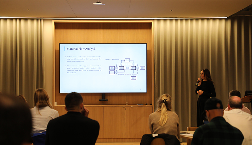 UK Fit Out people at a conference presentation