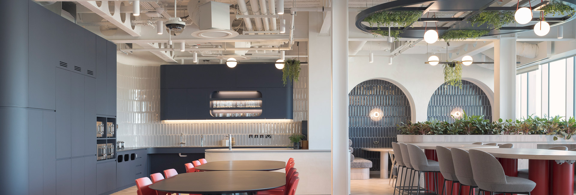 Several tables and chairs for employees to use