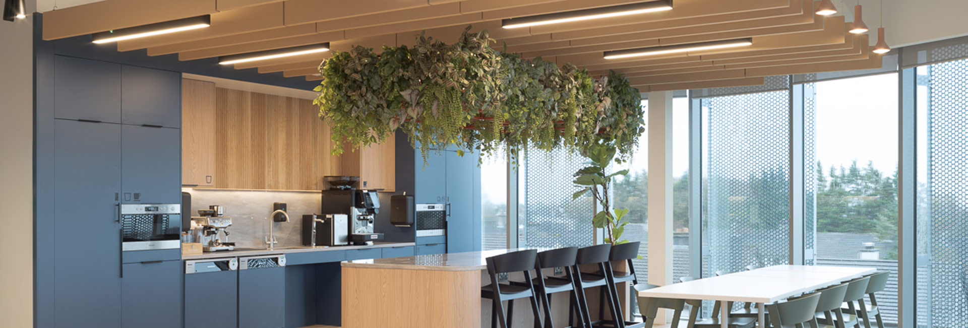 Kitchen area for employees to grab coffee and utilize throughout the day.