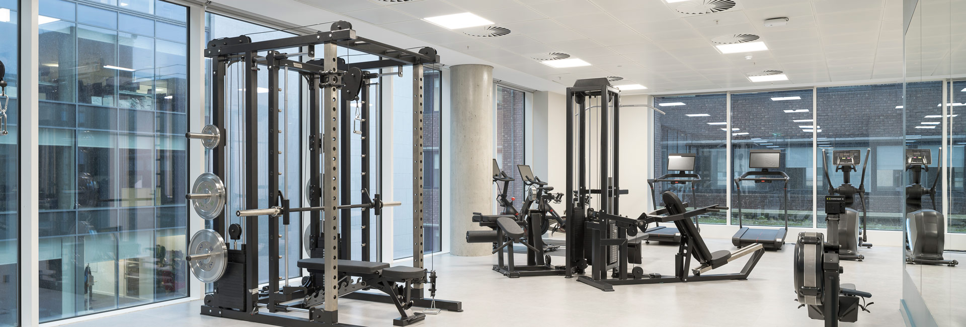 A gym with exercise equipment.