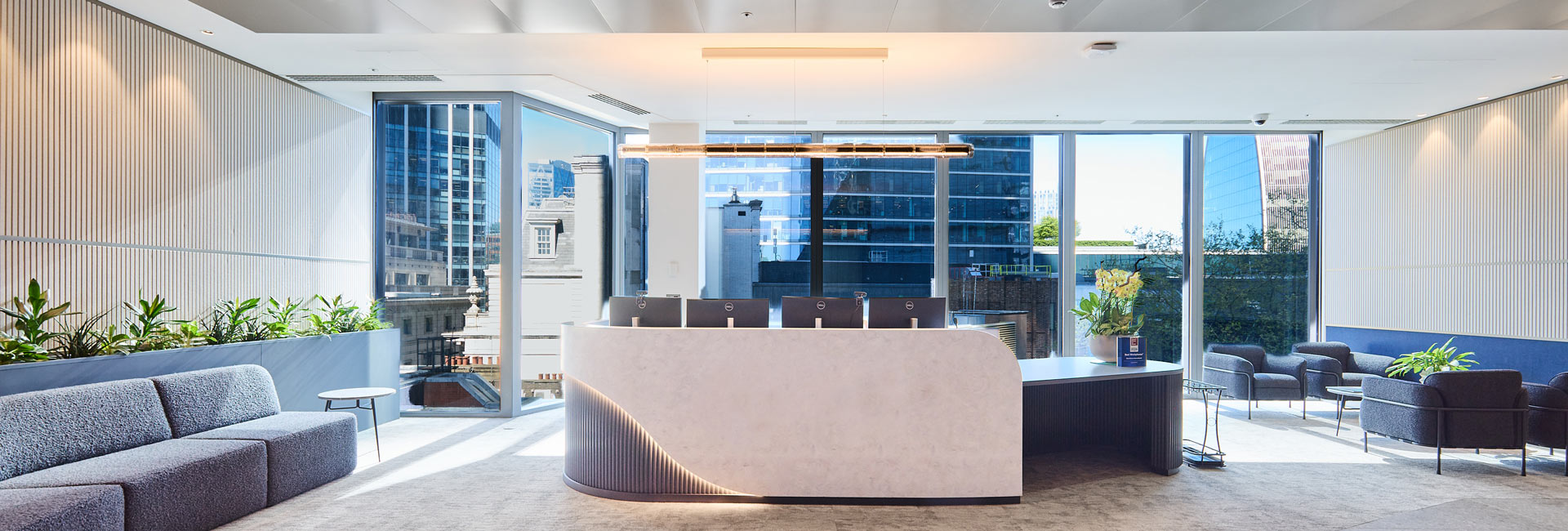 Reception desk with couches for seating