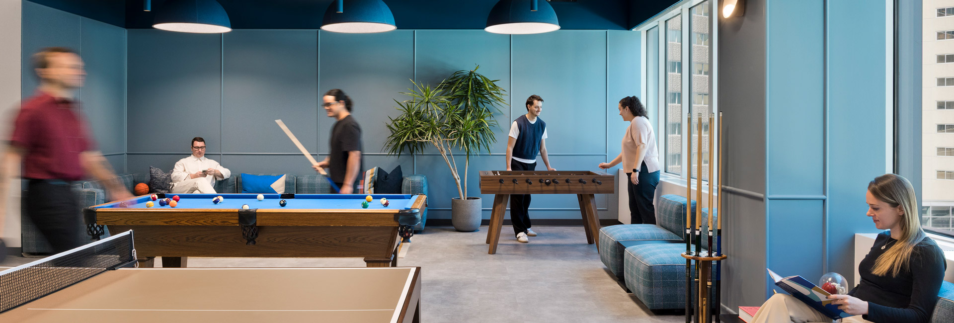 A recreation area with a pool table