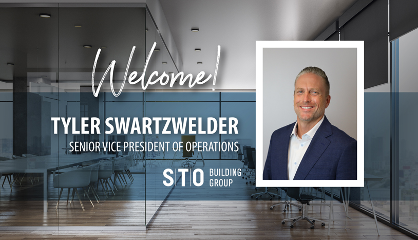 Promotional graphic announcing Tyler Swartzwelder's appointment as SVP of Operations at STOBG, featuring his headshot against a modern office conference room background.
