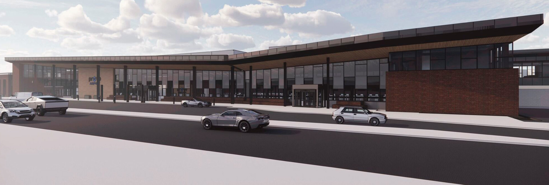 Architectural rendering of Provo Airport’s modern terminal exterior, featuring expansive windows, brick accents, and a sweeping roofline.